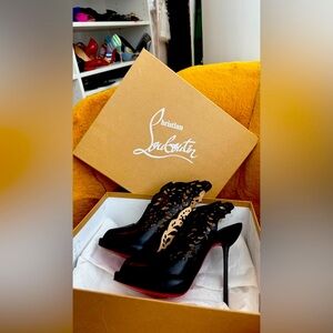 Christian Louboutin Black Heels with Signature Red Sole